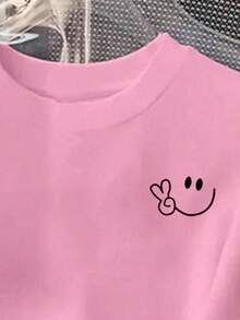 Women's Pink Round Neck Short Sleeve T-Shirt with Cute Smiling Face Graphic, Regular Fit Polyester Tee with Slight Stretch, Perfect for Casual Y2K Style - Rosa - Ver 3