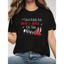 1pscLadies Fun Camiseta con diseño del Mago de Oz - Patrón negro, diseño de tacones rojos, cuello redondo, estilo casual - Primavera/Verano, lavable a máquina, ideal para fiestas y uso diario, estilo de texto llamativo, telas transpirables, imprescindible para mujeres, entrega desde almacén local, algodón suave y cómodo, disfruta de descuentos para Pascua, Halloween, Día de Acción de Gracias, Navidad, etc. 100% algodón - Negro - Ver 2