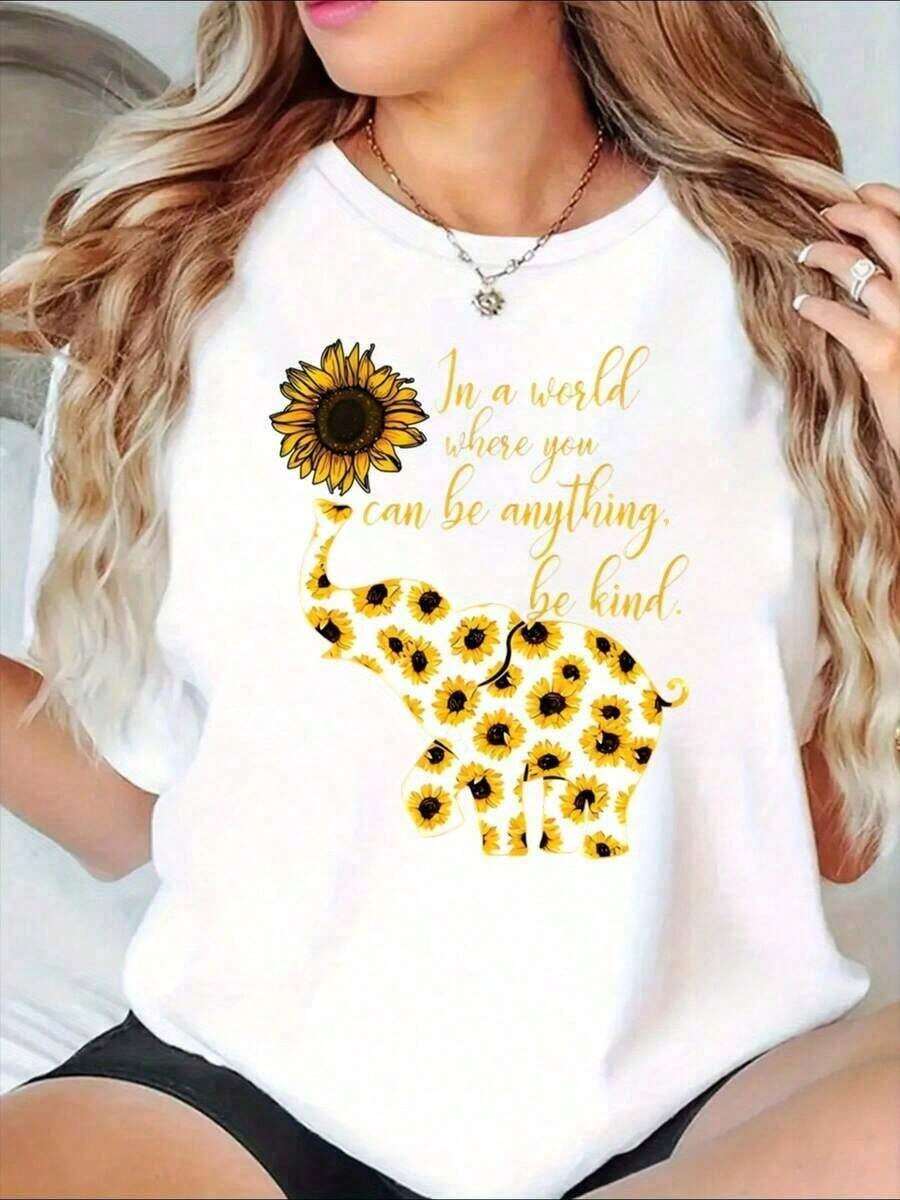 Camiseta de manga corta con cuello redondo y estampado de elefante de PremiumSunflower, con el mensaje inspirador "En un mundo donde puedes ser cualquier cosa, sé amable", ropa casual e idea de regalo para mujeres, 220g de calidad premium, 100% algodón puro, baja elasticidad, corte holgado, tallas S-XXL, camisetas a juego para parejas unisex, conjuntos de primavera para usar en capas, ropa de ocio diaria, ropa ecológica para el Día de la Madre y el Día de Victoria. - Blanco - Ver 1