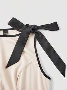 Vestido color albaricoque con cuello redondo, sin mangas, con ribete de contraste, lazo decorativo en la cintura y bajo acampanado - Caqui 2 - Ver 5