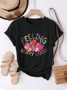 Camiseta de mujer, cómoda y casual, de manga corta y cuello redondo, con estampado de fresas y la frase "FEELING BERRY GOOD" combinada, de longitud regular, adecuada para todas las estaciones, moda para el día a día, ideal para la ropa femenina de primavera y verano. - Negro - Ver 6