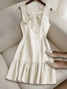 Vestido casual mini de mujer con tirantes de amarre, espalda descubierta, sin mangas, corte evasé y dobladillo con volantes - Albaricoque - Ver 2