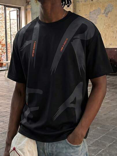 Fractyr Camiseta casual de manga corta con estampado de letra abstracta minimalista y holgada, estilo callejero para hombre