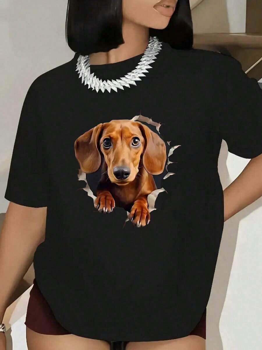 Camiseta de Mujer con Estampado de Perro Dachshund - Manga Corta, Cuello Redondo, Color Blanco () con Diseño de Cachorro Dachshund Asomando a Través de Papel Rasgado - Ligero y Transpirable, Ropa Casual para Amantes de los Dachshund (Lavable a Máquina) - Negro - Ver 1