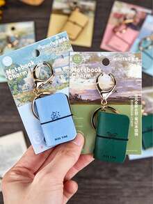 Mini PU Leather Keychain Notebook / Travel Essential / Impressionist Art Inspired Travel Diary -- Undated Inner Pages, Compact And Portable, Suitable For Daily Use Or Gifting To Friends And Family / Multiple Colors Available / Soft PU Leather Mini Planner / Creative "Ins Style" Keychain Pendant / Backpack Accessory / Portable Pocket Notebook / Exquisite Gift For Friends, Family, And Teachers - Multicolor - View 3