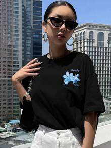 A Short-Sleeved T-Shirt With Front And Back Floral Prints, Featuring A Easy And Cheerful Design With Blue Flower Patterns, Perfect For Casual Wear In Spring And Summer - Black - View 3