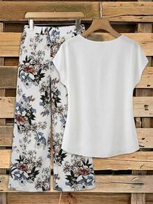 Clasi Conjunto de 2 piezas de blusa con moño elegante y minimalista en color rosa, combinada con pantalones de pierna ancha con estampado floral, adecuado para el verano - Blanco - Ver 2
