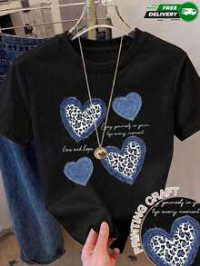 Limited EditionCamiseta de manga corta para mujer, adecuada para uso diario, salidas casuales, vacaciones y fines de semana, con estampado de corazones con textura de mezclilla y estampado de leopardo con texto decorativo, cuello redondo, sin bolsillos laterales, sin cremalleras, sin botones, fabricada en poliéster, estilo casual y bohemio, para primavera y verano. Envío nacional Algodón ligero - Negro - Ver 1