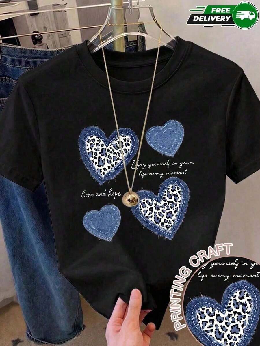 Limited EditionCamiseta de manga corta para mujer, adecuada para uso diario, salidas casuales, vacaciones y fines de semana, con estampado de corazones con textura de mezclilla y estampado de leopardo con texto decorativo, cuello redondo, sin bolsillos laterales, sin cremalleras, sin botones, fabricada en poliéster, estilo casual y bohemio, para primavera y verano. Envío nacional Algodón ligero - Negro - Ver 1