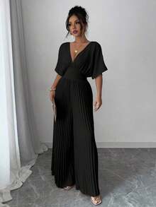 Mono de mujer elegante con cuello en V profundo, mangas tipo murciélago y plisados, de unicolor - Negro - Ver 4