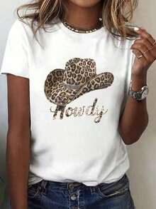 Camiseta de manga corta con cuello redondo y estampado de leopardo "Howdy" para mujer, 100% algodón - Estilo casual occidental con letras cursivas, estampado de animales en blanco y marrón, ajuste cómodo para todas las estaciones, ideal para conjuntos de primavera y verano, eventos temáticos y atuendos casuales, estilo de fin de semana, camiseta duradera, para amantes de la moda - Camiseta unisex de algodón, manga corta, cuello redondo, estilo vintage urbano, 100% algodón. - Multicolor - Ver 1
