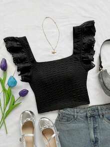 Elegante top corto de mujer de punto con plisados, adornos de encaje floral y diseño ideal para vacaciones - Negro - Ver 1
