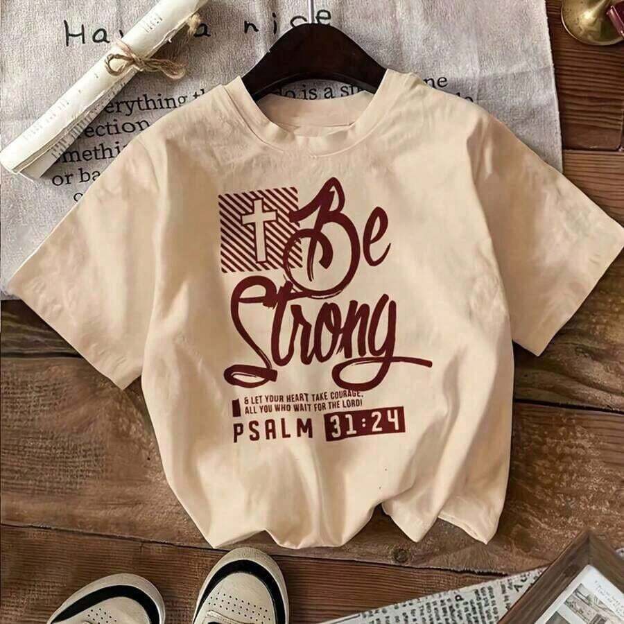 1 pieza de camiseta negra con diseño de cruz 'Be Strong' 'PSALM 91:24' con colgador de madera, zapatillas blancas con cordones negros sobre superficie de madera, camiseta cristiana elegante e informal para atuendos religiosos. Ropa para el Día de San Patricio, Tops de Verano, Ropa de Pascua para Mujer, Top con Gráfico de Huevo de Pascua, Camisetas Gráficas para Mujer, Camiseta Gráfica Divertida Vintage para Mujer 100% algodón - Albaricoque - Ver 1