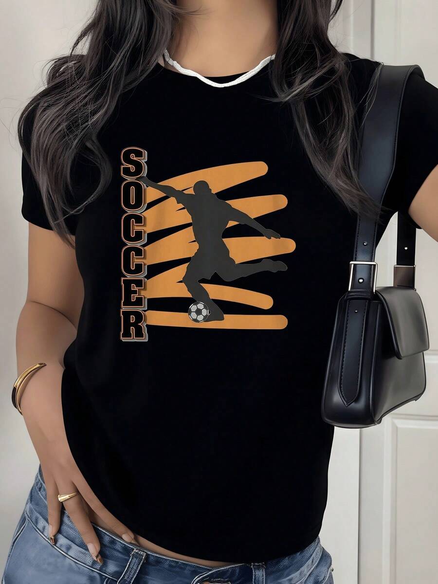 Figure Of A Player Jumping Energetically, Showing Passion And Powerful Movement Against An Orange Background, Symbolizing The Strength Of Sport And The Joy Of The Game. Modern Casual Women's T-Shirt For Football Lovers - 黑色 - 查看 1