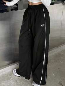 Pantalones casuales de pierna ancha con cordón en contraste y ribeteamionto - Negro - Ver 3