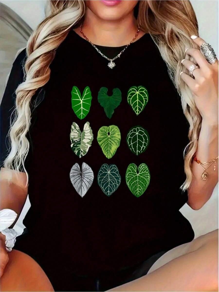 Camiseta Clásica con Temática de Plantas Tropicales - Estampado de Alocasia en Forma de Corazón, Camiseta de Manga Corta con Cuello Redondo, Diseñada para Amantes de las Plantas - Camiseta Casual para Uso Diario (Tallas S-XXL) - Regalo Ideal para Botánicos y Entusiastas de las Plantas de Interior, Ropa para Botánicos, Diseño Inspirado en la Naturaleza, Construcción Duradera, Camiseta Estampada Más Vendida - Negro - Ver 1
