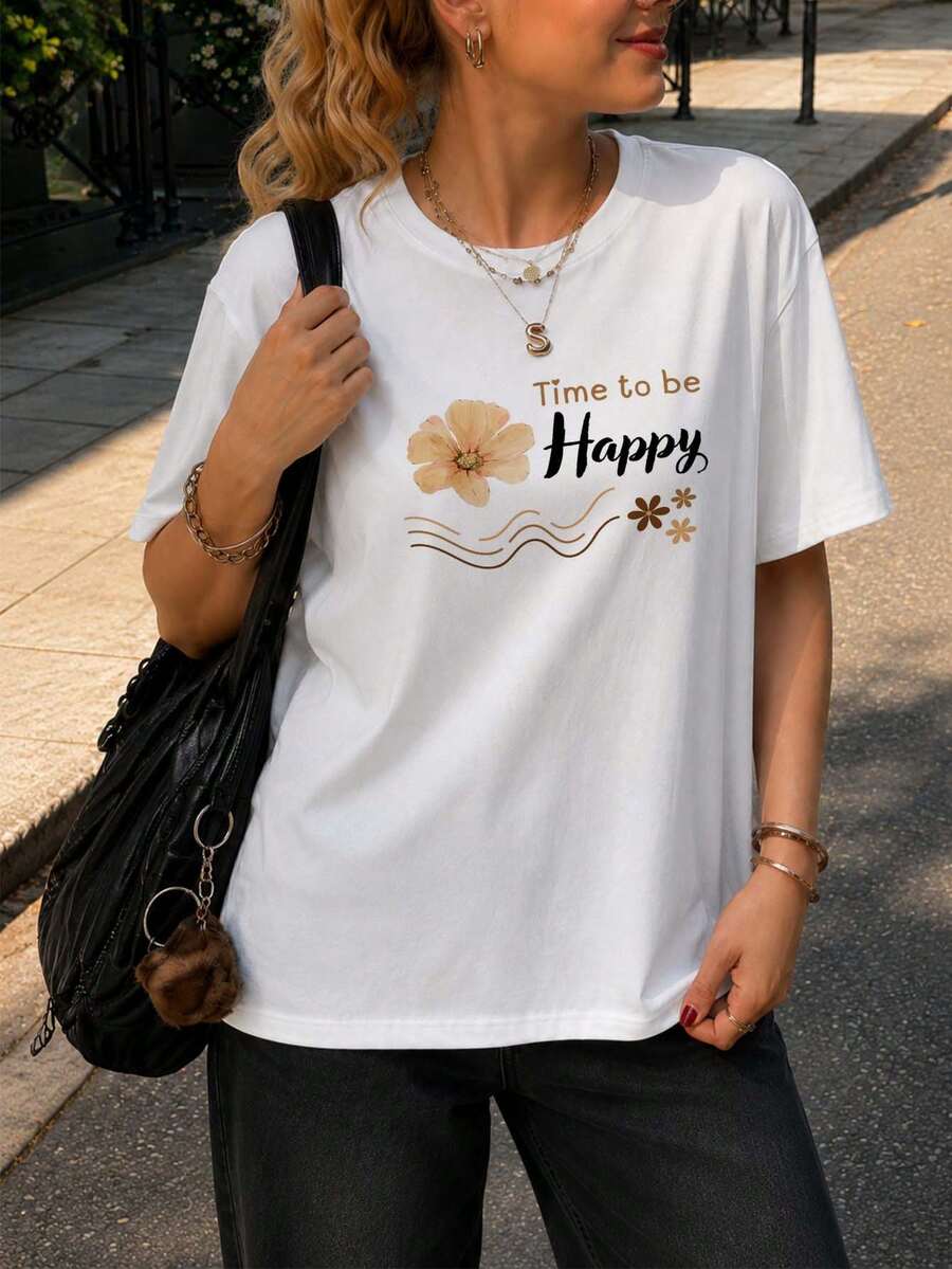 Camiseta Holgada para Mujer Blanca con Estampado Floral "Time to be Happy", Cuello Redondo de Manga Corta, Top Casual Inspirador, Ropa Cómoda para Uso Diario y Primavera, Estilo Relajado para Salidas Informales - Blanco - Ver 1
