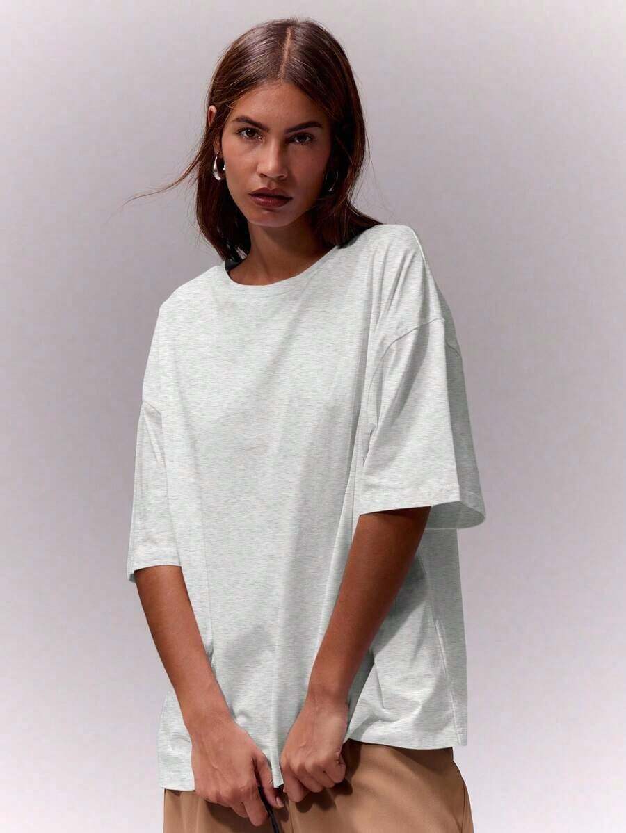 Camiseta de cuello redondo suave y oversize, parte de un armario cápsula casual, camiseta oversize para uso diario, aeropuerto, vuelta al colegio, elegante para primavera y verano, vacaciones - Gris 2 - Ver 1