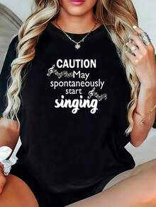 Elegante camiseta de uso diario de talla grande, con estampado de nota musical "CUIDADO, puede empezar a cantar espontáneamente", camiseta negra de manga corta y cuello redondo - lavable a máquina, adecuada para primavera, verano y otoño, estilo casual, ajuste cómodo, diseño moderno, versátil para uso diario, tela suave, estilo chic y a la moda. - Negro - Ver 8