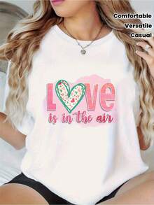 Premium White T-Shirt Adorned With A Heart-Shaped Balloon Pattern And The Phrase "Love Is In The Air," Soft Pink Lettering, And A Green Cupcake Design. Comfortable, Loose-Fitting, Crew Neck, Ideal For Casual Summer Parties, Suitable For All Seasons, Machine Washable, An Everyday Wardrobe Essential. Fun Design, Lightweight, Stylish T-Shirt-A Favorite Among Fashion Lovers. New Arrival - 白色 - 查看 3