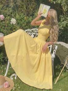 Vestido color albaricoque con cuello redondo, sin mangas, con ribete de contraste, lazo decorativo en la cintura y bajo acampanado - Amarillo claro - Ver 7