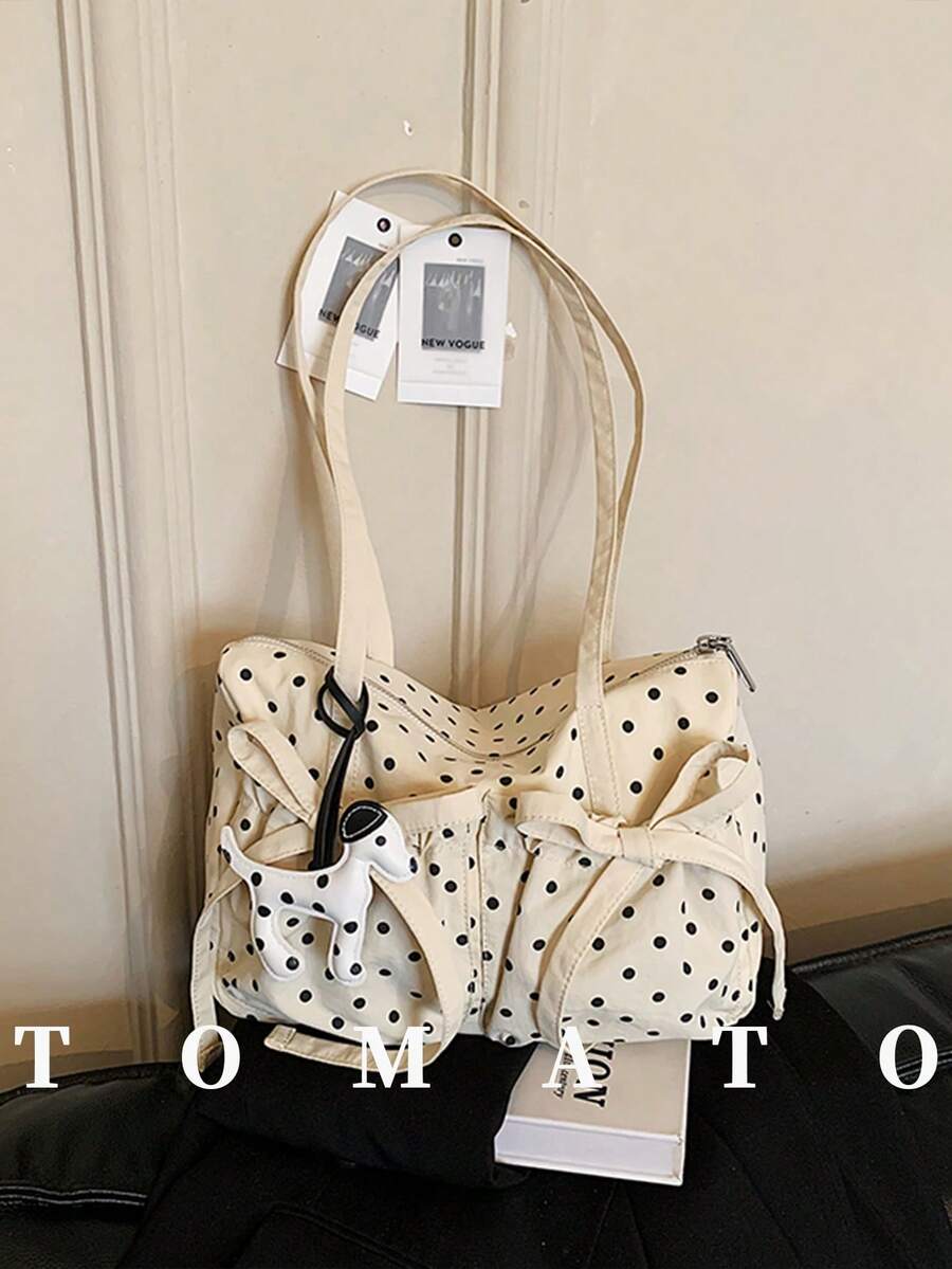 1个休闲风格女士单肩包，大容量多口袋设计，波点面料，不含挂件，适合日常使用。学院风包包，适合女学生、年轻女性——外出、购物、上课、约会、女士礼物、办公、工作、旅行
