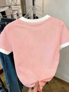 Blusa casual de cuello redondo con patrón de volantes y lazo asimétrico de color contrastante, adecuada para uso diario casual - Rosa 2 - Ver 2
