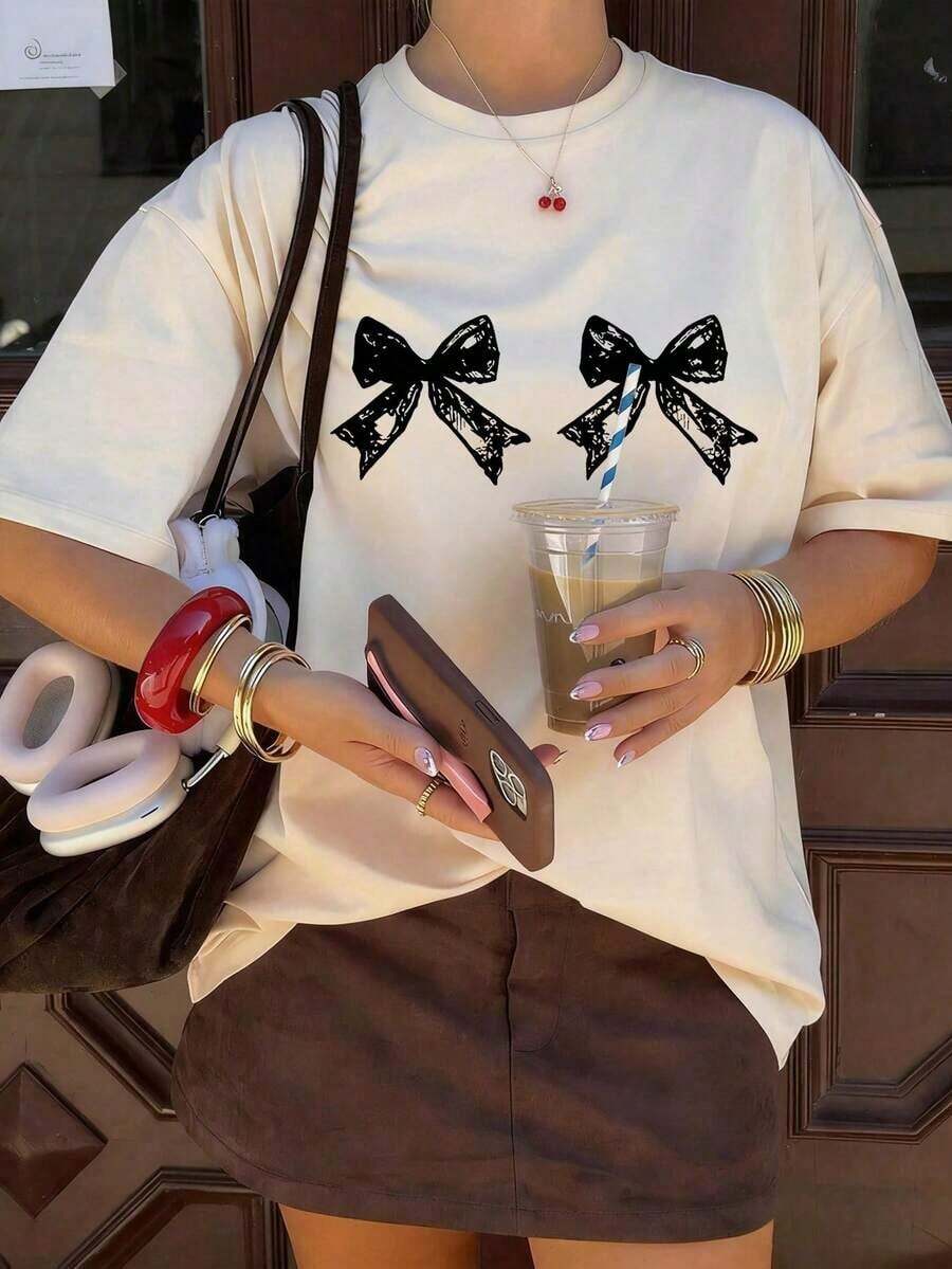 Limited Edition Women's Short-Sleeved, Round-Neck T-Shirt With Bow Print, Casual And Loose Fit, Versatile, For Everyday Wear In White. Lightweight Cotton. - 白色的 - 查看 1