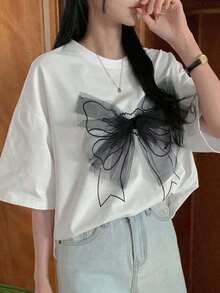 Camiseta de mujer moderna, informal, para fiestas y para estar en casa, 100% algodón, corte holgado. Vintage Camiseta de manga corta con holgura y estampado 3D de lazo para el Día de San Valentín para mujer, camiseta gráfica de verano con diseño sobredimensionadoFashion - Negro - Ver 3