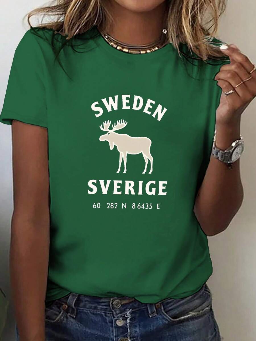 Camiseta clásica con estampado de ciervo en estilo sueco, de manga corta y cuello redondo, top casual, éxito de en la moda femenina de primavera y verano. - Verde - Ver 1