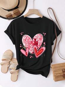 Camiseta de mujer: Camiseta cómoda y casual de manga corta con cuello redondo, que presenta un diseño de corazón con pedrería brillante y adornos románticos de candado y llave. El cuello redondo y la longitud regular la convierten en una prenda de moda adecuada para el uso diario en primavera y verano. - Negro - Ver 1