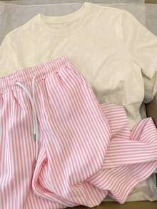 女款夏季圓領短袖T恤與條紋長褲套裝，豹紋、圓點、格紋，優雅、運動風、派對、健身房、夏季、Juneteenth、女款杏色套裝、杏色上衣、女款海灘套裝、隨機印花、女款夏季套裝、女款休閒套裝、學院風、日 - 杏色1+粉白豎條 - 查看 7
