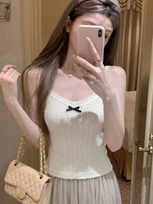 Bộ 2 món áo hai dây dệt kim + áo khoác cardigan ngắn cho nữ, kiểu dáng dễ thương ngọt ngào như nàng tiên, áo cardigan dệt kim dài tay màu trắng, áo hai dây dệt kim thắt nơ, trang phục layering ôm sát dáng người nhỏ nhắn với họa tiết rỗng. - trắng - Xem 7