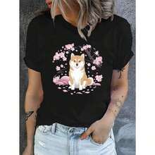 Camiseta Casual de Manga Corta para Mujer con Cuello Redondo, con un Diseño de Shiba Inu en un Bosque de Cerezos, Perfecta para Primavera y Verano, 100% Algodón - Negro - Ver 2