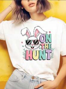 Modern MinimalistWomen's Cotton T-Shirt, Cute Easter Bunny With Pink Ears Eyes & Bandana, Behind Wooden HAPPY EASTER Sign, Colorful Flowers Eggs, Casual  Summer Tshirt For Women, Perfect Easter Giftcasual everyday - Blanco - Ver 1