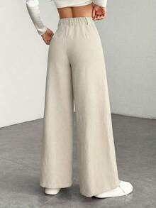 a Pantalones con bolsillo y cremallera de unicolor de poliéster, adecuados para uso diario en primavera, otoño e invierno, color negro - Albaricoque - Ver 4