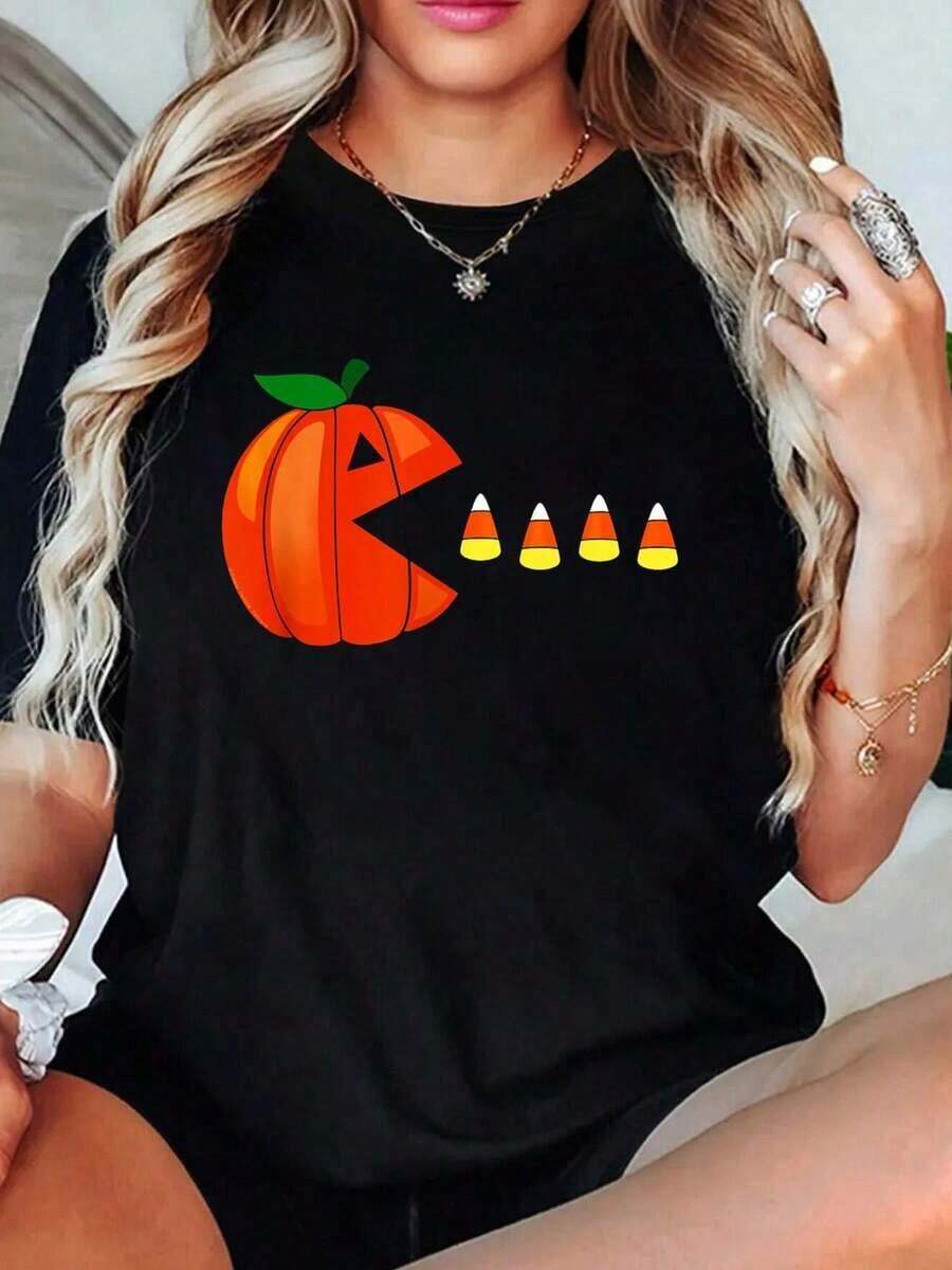 Camiseta divertida de Halloween con diseño de calabaza comiendo maíz dulce, de algodón, con estampado gráfico para mujer, cuello redondo, manga corta, estilo casual, holgada, versátil, estilo Y2k. - Negro - Ver 1