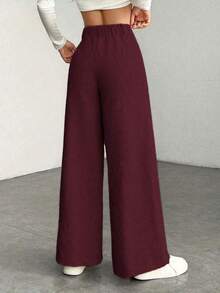 a Pantalones con bolsillo y cremallera de unicolor de poliéster, adecuados para uso diario en primavera, otoño e invierno, color negro - Burdeos - Ver 3