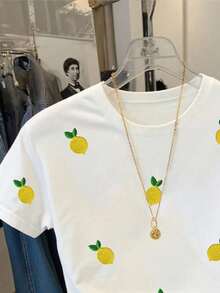 Camiseta de manga corta informal de cuello redondo para mujer, nueva colección de verano, decorada con bordados de limones, ideal para usar en verano. - Blanco - Ver 3