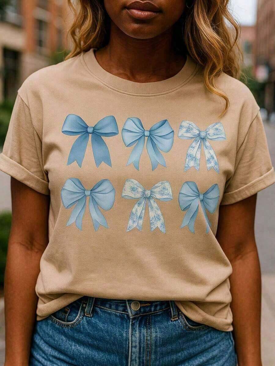 Vian Lanman Women's Short-Sleeved T-Shirt, Casual Summer Style, Made Of Soft Cotton, With A Round Neck And Blue Lace Bow. Pink Color. 100% Cotton. - 杏色 - 查看 1