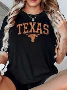 Toro con cuernos simbolizando fuerza y espíritu libre sobre la palabra TEXAS en tono terroso camiseta de mujer casual cómoda para uso diario y moda urbana - Negro - Ver 8