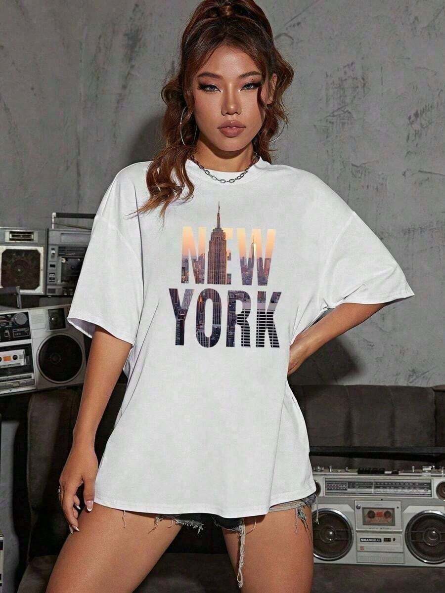 Camiseta unisex de manga corta 100% algodón con estampado de paisajes y letras y hombros caídos |         Camiseta Casual de Moda con Cuello Redondo y Manga Corta |         Ropa Urbana Retro Vintage de Talla Grande Y2K |         Ropa de Tallas Grandes para Mujer para Todas las Temporadas - Ropa Diaria Universitaria para Hombres y Mujeres 100% Algodón - Blanco - Ver 1