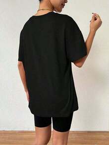 Camiseta Casual Genial 1 Pieza, 2026, Camiseta de Mujer de Corte Holgado con Hombros Caídos y Estampado de Letras, Camisetas Gráficas de Estilo Sencillo, Tops de Mujer, Conjuntos de Vacaciones, Verano, Camisas, Camisa Blanca, Camisetas Gráficas, Tops de Verano, Top, Tops de Moda - Negro - Ver 2