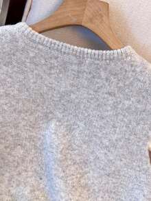 1 pieza Chaleco de punto de mujer minimalista de unicolor con botón de metal suave, parte superior casual versátil, suéter de moda de cuello redondo - Gris Claro - Ver 4