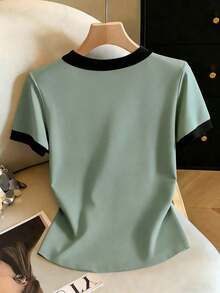 Blusa de mujer de cuello redondo con ribete de contraste, abotonadura metálica de media cartera, manga corta, ajustada y acortada.Top amarillo claro, top amarillo, top amarillo pastel, top de verano, top amarillo lindo, top amarillo para m - Verde - Ver 2