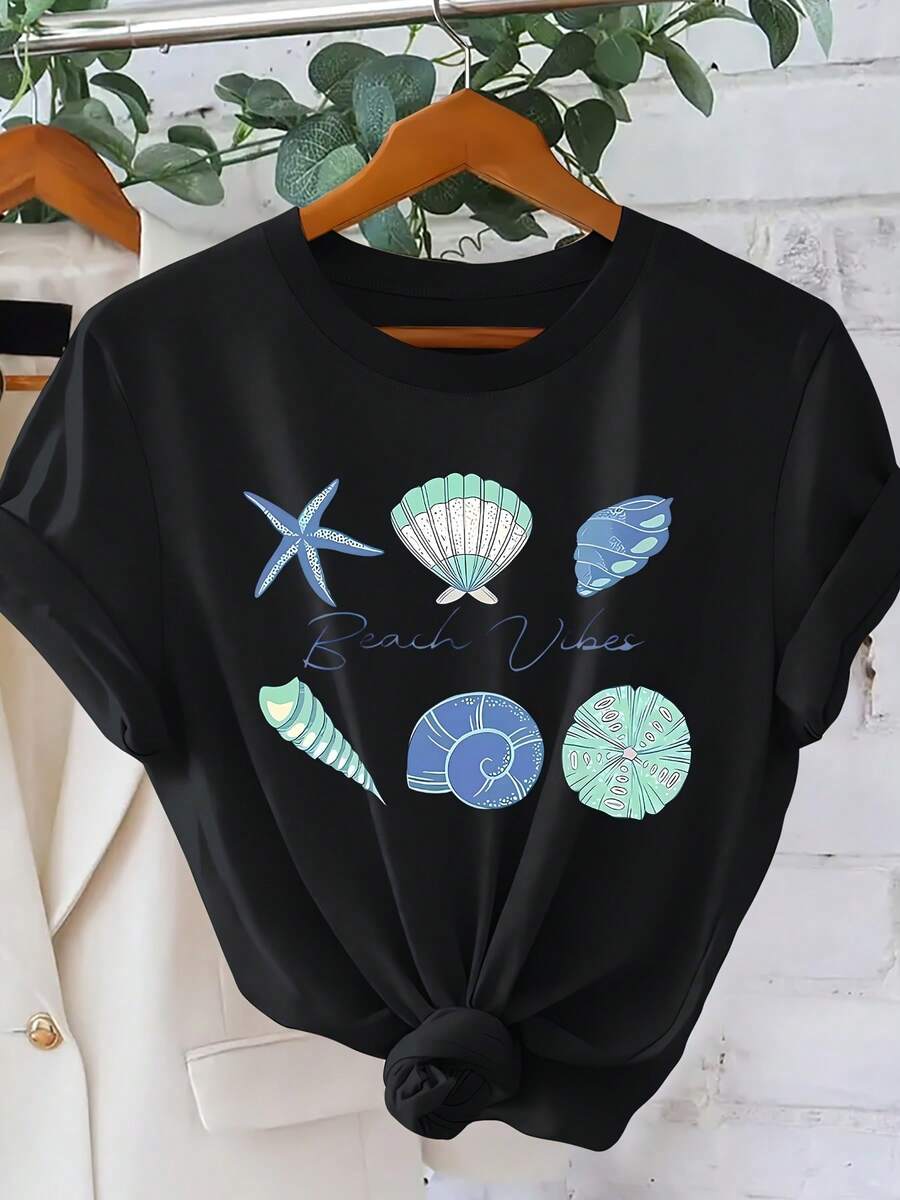 Camiseta de manga corta para mujer con estampado de conchas marinas, estilo resort, para primavera y verano, ideal para el uso diario, top dulce y adelgazante, cuello redondo sencillo, cómoda y transpirable, en oferta de . - Negro - Ver 1