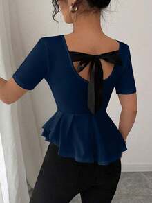 Elegante blusa de punto jacquard con lunares, lazo en la espalda, cintura ceñida y bajo asimétrico - Azul marino - Ver 7
