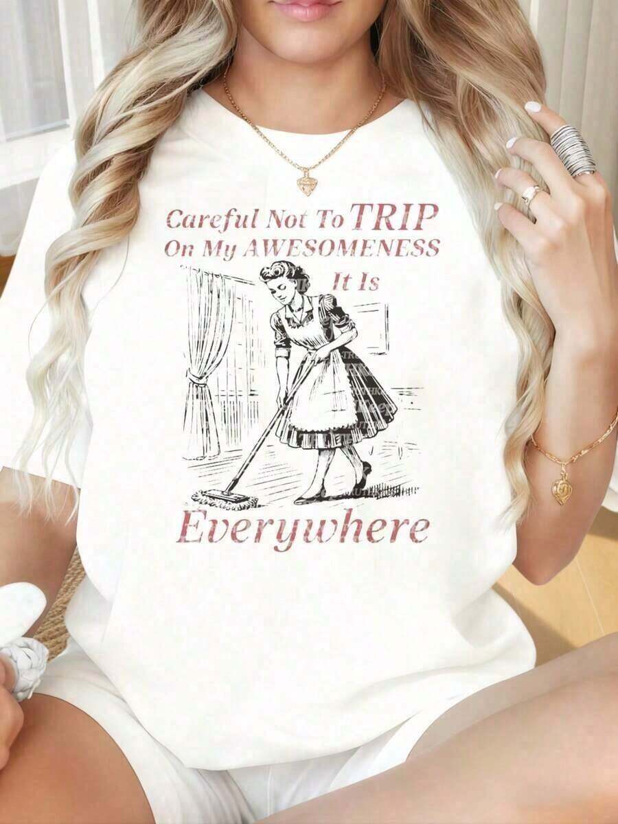 Camiseta de manga corta para mujer con cuello redondo y estampado divertido. "Cuidado de no tropezar con mi genialidad, está en todas partes". Camiseta vintage de ama de casa para mujer, camiseta gráfica casual, camiseta divertida. Ideal para el Día de San Valentín, Navidad, fiestas, actividades deportivas, vacaciones, salidas, deportes y otros regalos festivos (180g). Camisetas Gráficas Occidentales para Hombre, Ropa para Hombre, Camisetas Gráficas para Mujer, Ropa de Verano, Tops de Verano, Camisetas Gráficas 100% Algodón - Blanco - Ver 1