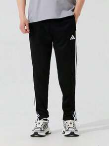Adidas Quần Tiro 25 Series | Quần nam xẻ tà bên hông, nhanh khô, thích hợp đi làm và tập luyện. - màu đen - Xem 1