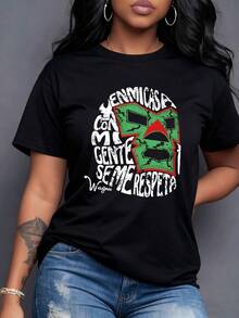 El gráfico muestra unaáscara de luchador en verde y rojo que simboliza fuerza orgullo cultural y respeto con el texto pintado a mano que expresa confianza valentía yón entre personas Camiseta de mujer% algodón-Vintage Street Style Unisex Loose Cotton Short Sleeve Crew Neck-Shirt - Negro - Ver 1